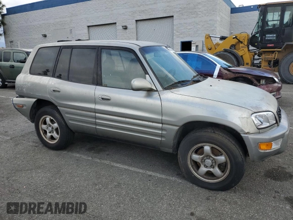 1999 Toyota RAV4 with VIN JT3GP10V0X7054819, listed as a Copart auction lot 44864015 with 140,095 mi miles and Salvage Title. Bid and sale history available at DreamBid. Image 4.