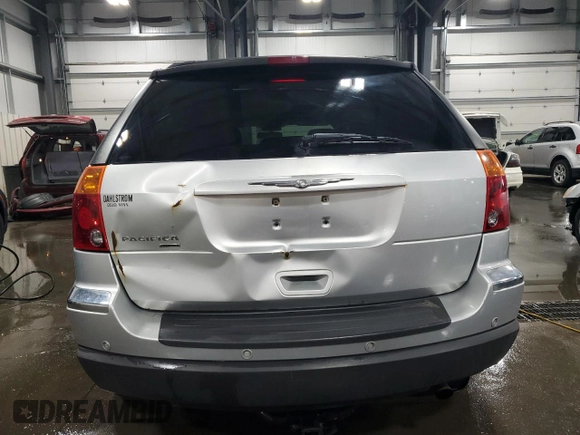 2005 Chrysler Pacifica Touring with VIN 2C4GM68425R368366, listed as a Copart auction lot 54777675 with 122,521 mi miles and Salvage Title. Bid and sale history available at DreamBid. Image 6.