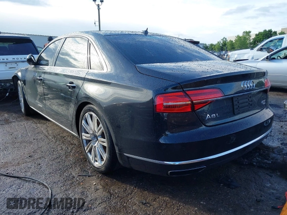 2015 Audi A8 4.0T z VIN WAU32AFD6FN022648, wystawiony jako IAAI lot #42358142 z przebiegiem 103 416 mil mil oraz . Historia ofert i sprzedaży dostępna na DreamBid. Obrazek 3.