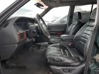 1998 Jeep Grand Cherokee Laredo with VIN 1J4GZ58S3WC152962, listed as a Copart auction lot 79333864 with 0 mi miles and Clean Title. Bid and sale history available at carsss.com. Image 7.