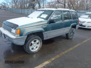 1993 Jeep Grand Cherokee Laredo with VIN 1J4GZ58Y9PC583439, listed as a IAAI auction lot 41794732 with 211,691 mi miles and . Bid and sale history available at DreamBid. Image 2.