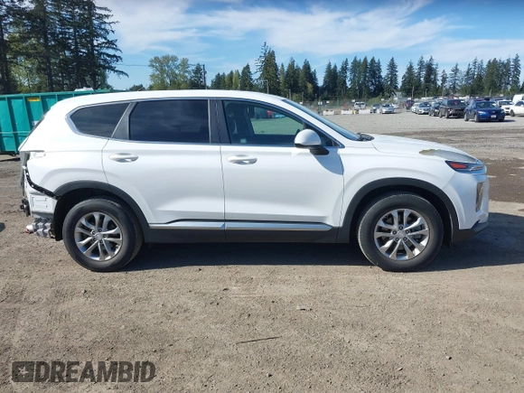 2019 Hyundai Santa Fe SE with VIN 5NMS2CAD0KH098259, listed as a IAAI auction lot 42075356 with 55,163 mi miles and . Bid and sale history available at DreamBid. Image 14.