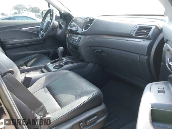 2020 Honda Pilot EX-L with VIN 5FNYF5H54LB009448, listed as a IAAI auction lot 41697106 with 63,310 mi miles. Bid and sale history available at carsss.com. Image 5.