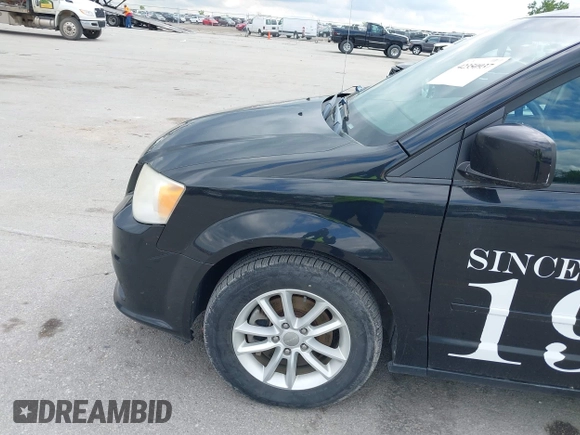 2014 Dodge Grand Caravan SXT z VIN 2C4RDGCGXER388459, wystawiony jako IAAI lot #42350937 z przebiegiem 149 276 mil mil oraz . Historia ofert i sprzedaży dostępna na DreamBid. Obrazek 12.