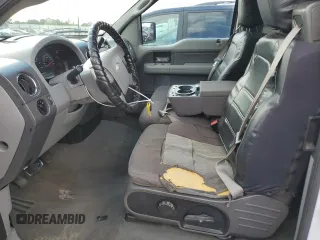 2005 Ford F-150 XLT with VIN 1FTPX12595NA67280, listed as a Copart auction lot 56922545 with 237,318 mi miles and Salvage title. Bid and sale history available at DreamBid. Image 7.