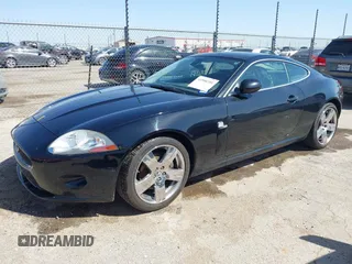 2009 Jaguar XK with VIN SAJWA43B295B31026, listed as a IAAI auction lot 41950751 with 110,331 mi miles. Bid and sale history available at carsss.com. Image 2.