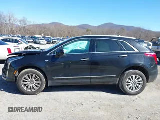 2018 Cadillac XT5 FWD with VIN 1GYKNARS5JZ235585, listed as a IAAI auction lot 41607440 with 77,220 mi miles and . Bid and sale history available at DreamBid. Image 14.