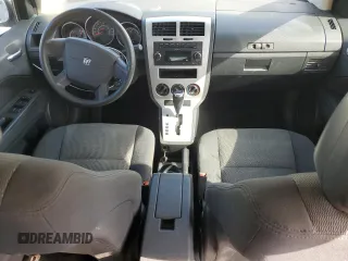 2009 Dodge Caliber SXT with VIN 1B3HB48AX9D157186, listed as a Copart auction lot 52892065 with 218,024 mi miles and Salvage Title. Bid and sale history available at carsss.com. Image 8.