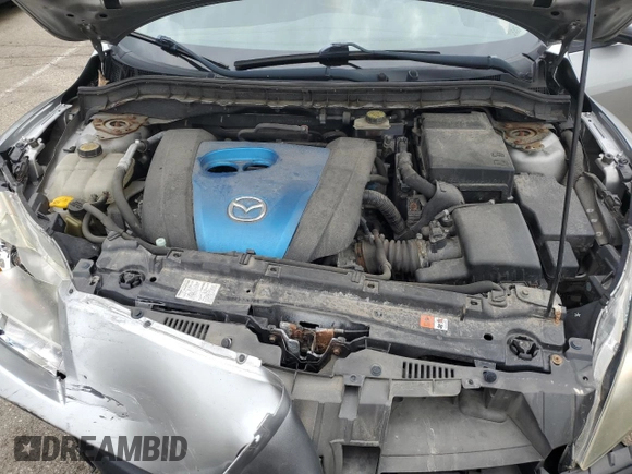 2012 Mazda 3 i Touring z VIN JM1BL1V77C1671336, wystawiony jako Copart lot #56644105 z przebiegiem 166 382 mil mil oraz Szkoda całkowita • Salvage title. Historia ofert i sprzedaży dostępna na DreamBid. Obrazek 11.