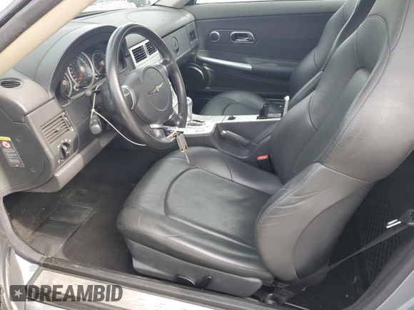 2004 Chrysler Crossfire z VIN 1C3AN69L14X024234, wystawiony jako Copart lot #51322415 z przebiegiem 70 243 mil mil oraz Szkoda całkowita • Salvage title. Historia ofert i sprzedaży dostępna na DreamBid. Obrazek 7.