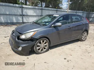 2012 Hyundai Accent SE with VIN KMHCU5AE9CU016179, listed as a Copart auction lot 63361215 with 144,748 mi miles and Salvage title. Bid and sale history available at DreamBid. Image 1.