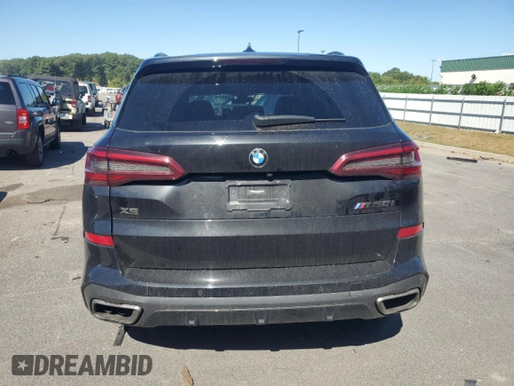 2020 BMW X5 M50i with VIN 5UXJU4C05LL228167, listed as a Copart auction lot 70390194 with Not Provided miles and Salvage Title. Bid and sale history available at DreamBid. Image 6.