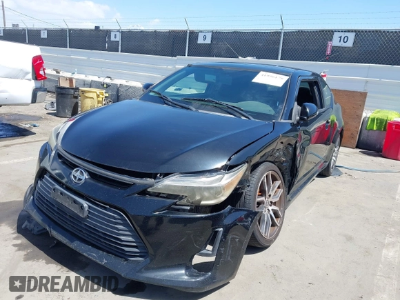 2014 Scion tC with VIN JTKJF5C71E3072199, listed as a IAAI auction lot 41956178 with 154,730 mi miles. Bid and sale history available at carsss.com. Image 6.