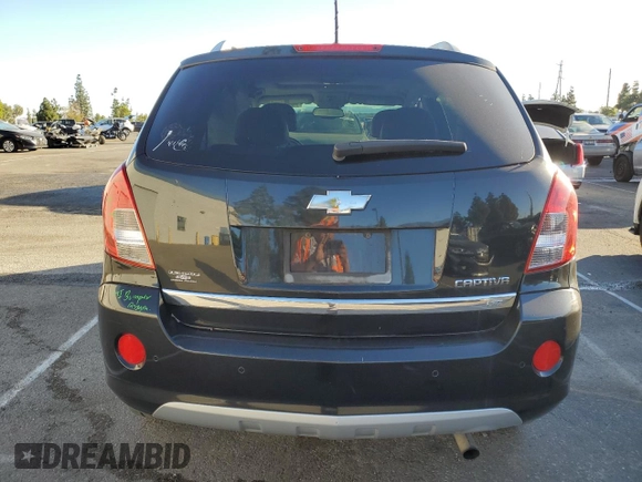2014 Chevrolet Captiva Sport LTZ with VIN 3GNAL4EK6ES569410, listed as a Copart auction lot 79771094 with 142,157 mi miles and Salvage Title. Bid and sale history available at DreamBid. Image 6.