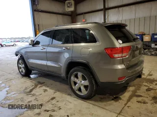 2013 Jeep Grand Cherokee Overland with VIN 1C4RJFCT5DC599866, listed as a Copart auction lot 51837395 with 105,521 mi miles and Salvage Title. Bid and sale history available at carsss.com. Image 2.