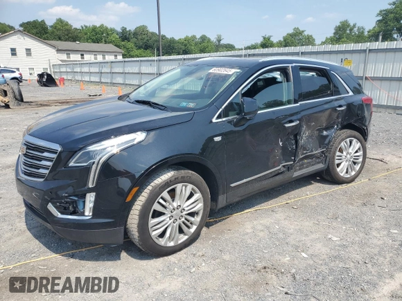 2019 Cadillac XT5 Premium Luxury AWD with VIN 1GYKNFRS9KZ223065, listed as a Copart auction lot 60902645 with 101,168 mi miles and Salvage title. Bid and sale history available at DreamBid. Image 1.