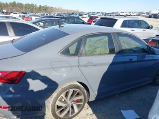 2021 Volkswagen Jetta GLI S with VIN 3VW6T7BUXMM019570, listed as a IAAI auction lot 41879222 with 42,948 mi miles and . Bid and sale history available at DreamBid. Image 13.