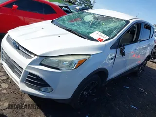 2015 Ford Escape SE with VIN 1FMCU0G77FUB55775, listed as a IAAI auction lot 41744893 with 164,178 mi miles and . Bid and sale history available at DreamBid. Image 2.