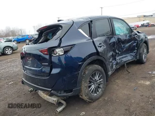 2020 Mazda CX-5 Touring with VIN JM3KFBCM9L0799502, listed as a IAAI auction lot 42007207 with 43,364 mi miles. Bid and sale history available at carsss.com. Image 4.