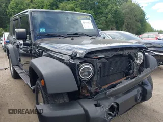 2014 Jeep Wrangler Unlimited Sport with VIN 1C4BJWDGXEL227167, listed as a IAAI auction lot 42769453 with 199,553 mi miles and . Bid and sale history available at DreamBid. Image 1.