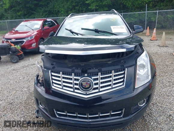2015 Cadillac SRX Premium Collection z VIN 3GYFNGE36FS626641, wystawiony jako IAAI lot #42532380 z przebiegiem 178 799 mil mil oraz . Historia ofert i sprzedaży dostępna na DreamBid. Obrazek 12.
