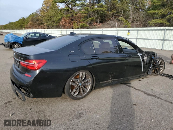 2018 BMW 7 Series M760i xDrive with VIN WBA7H6C53JG614984, listed as a Copart auction lot 73671322 with 28,191 mi miles. Bid and sale history available at carsss.com. Image 3.