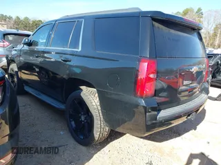 2015 Chevrolet Tahoe LT with VIN 1GNSCBKC5FR156050, listed as a IAAI auction lot 41486815 with 220,599 mi miles and . Bid and sale history available at DreamBid. Image 3.