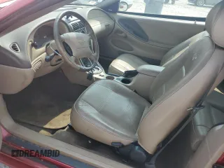 2003 Ford Mustang Deluxe с VIN 1FAFP44443F435749, выставлен на аукционе Copart как лот 59422535 с пробегом 84 397 миль миль и Чистый • Clean title. История ставок и продаж доступна на DreamBid. Изображение 7.