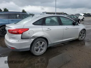 2016 Ford Focus SE with VIN 1FADP3FE5GL233081, listed as a Copart auction lot 65498195 with 89,674 mi miles and Salvage title. Bid and sale history available at DreamBid. Image 3.