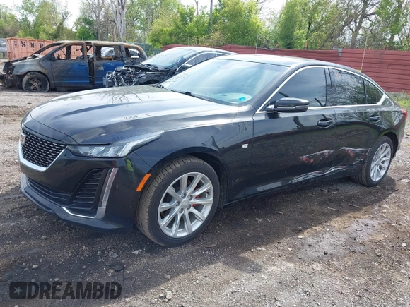 2021 Cadillac CT5 Luxury z VIN 1G6DX5RKXM0146235, wystawiony jako IAAI lot #42214676 z przebiegiem 72 847 mil mil oraz . Historia ofert i sprzedaży dostępna na DreamBid. Obrazek 21.