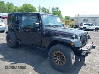2017 Jeep Wrangler Unlimited Rubicon Recon z VIN 1C4BJWFG7HL525709, wystawiony jako IAAI lot #42569577 z przebiegiem 119 560 mil mil oraz . Historia ofert i sprzedaży dostępna na DreamBid. Obrazek 1.