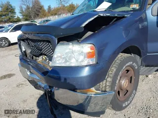 2004 Ford F-150 XLT with VIN 1FTRW12W44KD01717, listed as a IAAI auction lot 41252201 with 118,157 mi miles. Bid and sale history available at carsss.com. Image 18.