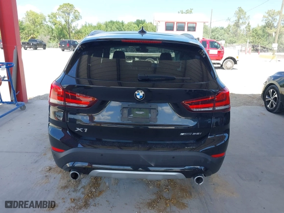 2021 BMW X1 sDrive28i with VIN WBXJG7C02M5S59010, listed as a IAAI auction lot 41933532 with 49,207 mi miles. Bid and sale history available at carsss.com. Image 16.