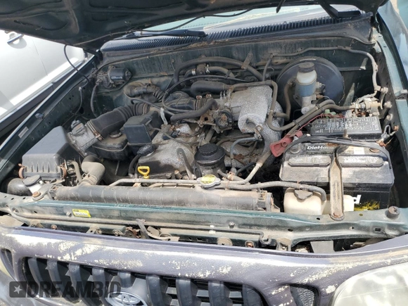 2002 Toyota Tacoma with VIN 5TENL42N82Z034851, listed as a Copart auction lot 56174825 with 206,369 mi miles and Salvage title. Bid and sale history available at DreamBid. Image 11.