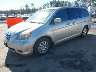 2008 Honda Odyssey EX-L with VIN 5FNRL38708B110657, listed as a IAAI auction lot 41854985 with 253,985 mi miles and . Bid and sale history available at carsss.com. Image 2.