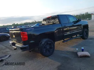 2015 Chevrolet Silverado 1500 LT with VIN 1GCVKREC3FZ241773, listed as a IAAI auction lot 42054178 with 146,304 mi miles. Bid and sale history available at carsss.com. Image 4.