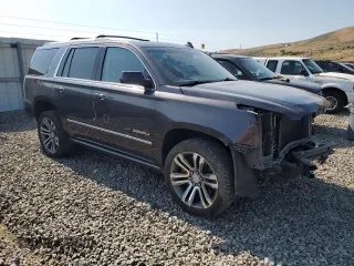 2018 GMC Yukon Denali with VIN 1GKS2CKJXJR217857, listed as a Copart auction lot 62943934 with 122,015 mi miles and Salvage Title. Bid and sale history available at carsss.com. Image 4.