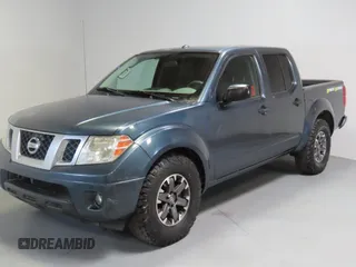 2014 Nissan Frontier SV with VIN 1N6AD0ERXEN763554, listed as a Copart auction lot 64313295 with 109,756 mi miles and Salvage title. Bid and sale history available at DreamBid. Image 2.
