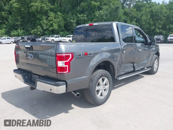 2018 Ford F-150 XL with VIN 1FTEW1E57JFA95086, listed as a IAAI auction lot 42574704 with 77,301 mi miles and . Bid and sale history available at DreamBid. Image 4.