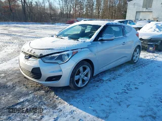 2012 Hyundai Veloster w/Gray Int with VIN KMHTC6AD0CU034568, listed as a IAAI auction lot 41460659 with 141,826 mi miles and . Bid and sale history available at DreamBid. Image 2.