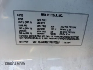 2023 Tesla Model Y Long Range z VIN 7SAYGAEE1PF810888, wystawiony jako Copart lot #88991735 z przebiegiem Nie podano mil oraz Nie do naprawy • Non repairable. Historia ofert i sprzedaży dostępna na DreamBid. Obrazek 15.