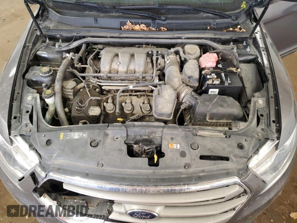2014 Ford Taurus SEL z VIN 1FAHP2E85EG146469, wystawiony jako Copart lot #59506195 z przebiegiem 158 124 mil mil oraz Szkoda całkowita • Salvage title. Historia ofert i sprzedaży dostępna na DreamBid. Obrazek 11.