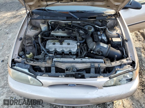 1998 Ford Escort LX with VIN 1FAFP10P5WW124477, listed as a Copart auction lot 88403865 with 227,936 mi miles and Salvage title. Bid and sale history available at DreamBid. Image 11.
