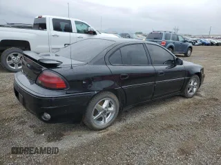 2000 Pontiac Grand Am GT1 with VIN 1G2NV52E1YM822599, listed as a Copart auction lot 42972085 with 0 mi miles and Clean Title. Bid and sale history available at carsss.com. Image 3.