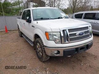 2011 Ford F-150 XL with VIN 1FTFW1EF5BFA08901, listed as a IAAI auction lot 42165617 with 310,898 mi miles. Bid and sale history available at carsss.com. Image 1.