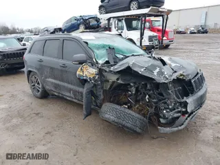 2018 Jeep Grand Cherokee Trailhawk with VIN 1C4RJFLGXJC143778, listed as a IAAI auction lot 41101074 with NaN miles. Bid and sale history available at carsss.com. Image 1.