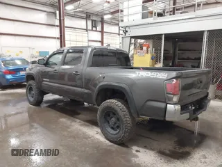 2017 Toyota Tacoma SR5 with VIN 3TMDZ5BN8HM016825, listed as a IAAI auction lot 41658400 with 166,098 mi miles. Bid and sale history available at carsss.com. Image 3.