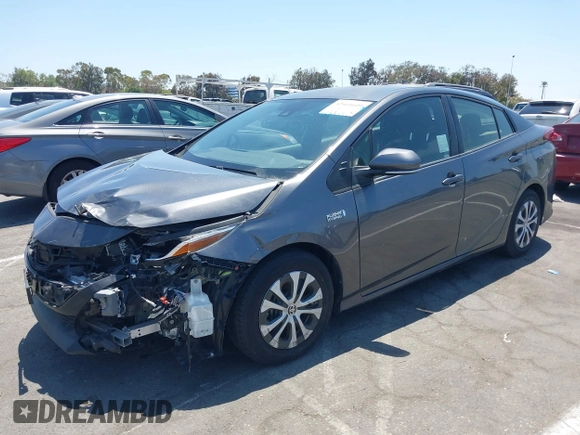2021 Toyota Prius LE with VIN JTDKAMFPXM3170372, listed as a IAAI auction lot 42661609 with 47,977 mi miles and . Bid and sale history available at DreamBid. Image 18.