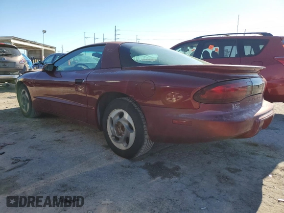 1995 Pontiac Firebird Firebird z VIN 2G2FS22S3S2240907, wystawiony jako Copart lot #77215444 z przebiegiem 111 636 mil mil oraz Szkoda całkowita • Salvage title. Historia ofert i sprzedaży dostępna na DreamBid. Obrazek 2.