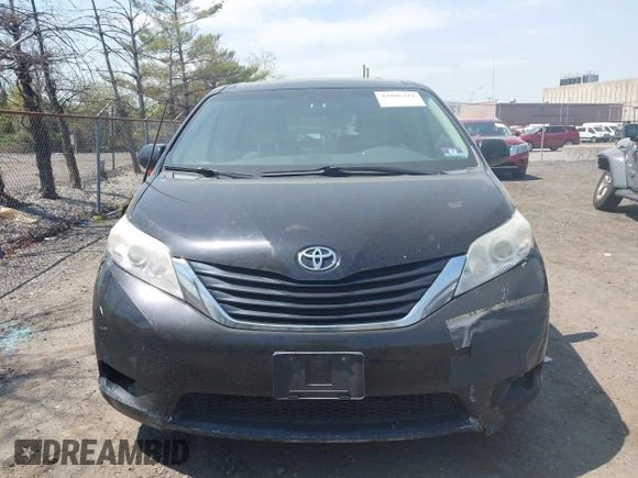 2011 Toyota Sienna LE AAS with VIN 5TDKK3DC4BS173688, listed as a IAAI auction lot 42106211 with 282,301 mi miles. Bid and sale history available at carsss.com. Image 12.